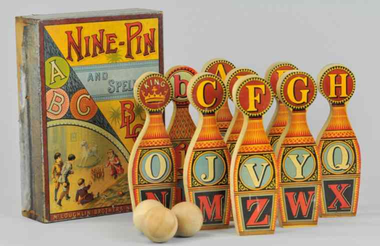 Appraisal: NINE PIN AND SPELLING BLOCKS McLouglin Bros boxed set very