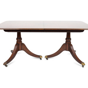 Appraisal: A Regency Style Mahogany Two-pedestal Dining Table by Baker TH