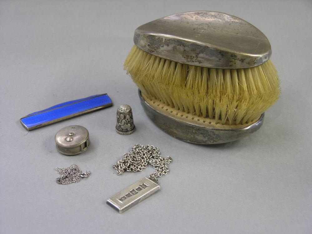 Appraisal: A pair of gentleman's silver clothes brushes together with a