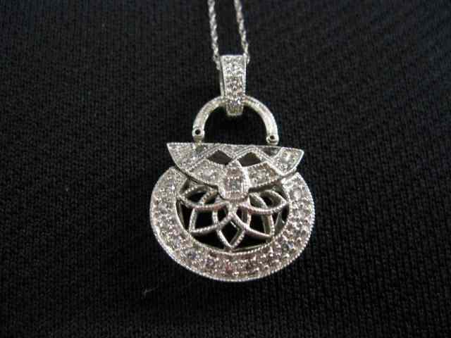 Appraisal: Diamond Pendant of a Miniature Purse k white gold on