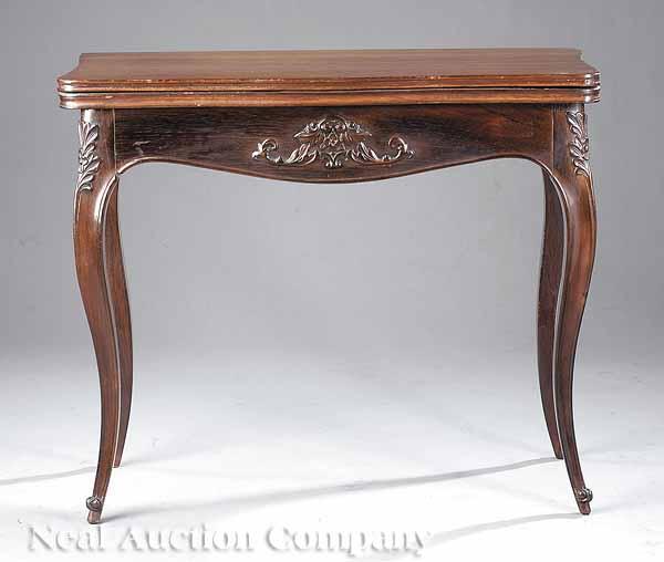 Appraisal: An English Carved Rosewood Games Table mid- th c serpentine