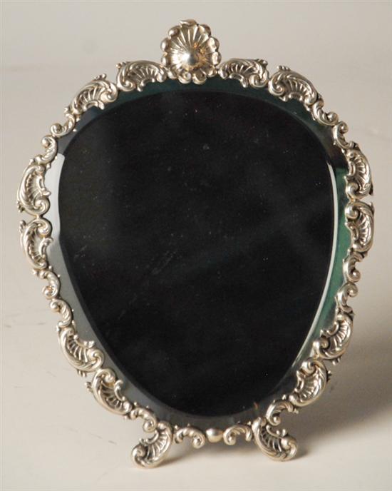 Appraisal: A Portuguese Sterling Frame Mirror with a wood easel back