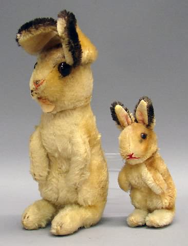 Appraisal: Pair of sitting up rabbits Has open felt mouth embroidered