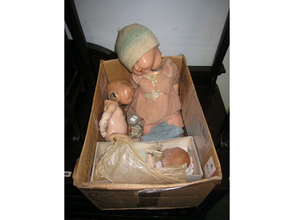 Appraisal: Lot comprising two dolls and a doll's head by Armande