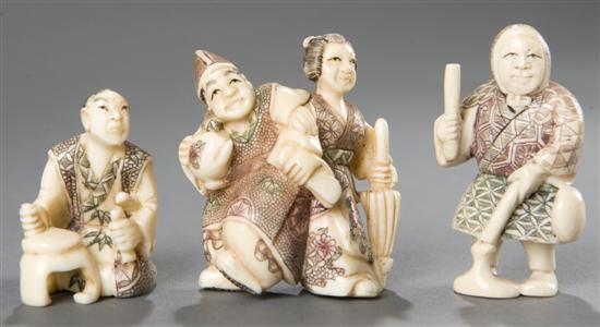 Appraisal: Group of Japanese ivory figural netsukes Early th century Man