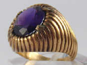 Appraisal: A yellow metal tests carat gold amethyst ring amethyst approx