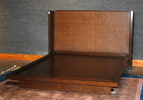 Appraisal: A walnut and caned platform bed McGuire Furniture Company st