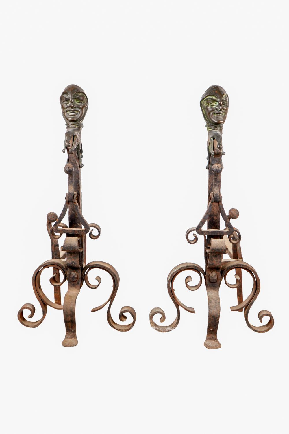 Appraisal: PAIR OF BRONZE IRON JESTER FORM CHENETSCondition with some areas