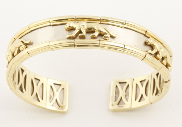 Appraisal: KY cuff bracelet features five panthers l grams total weight