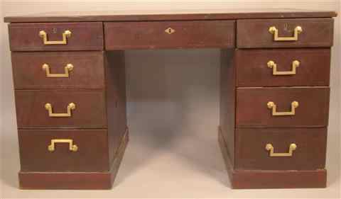 Appraisal: GEORGE III STYLE TOOLED LEATHER-COVERED DESK the rectangular top over