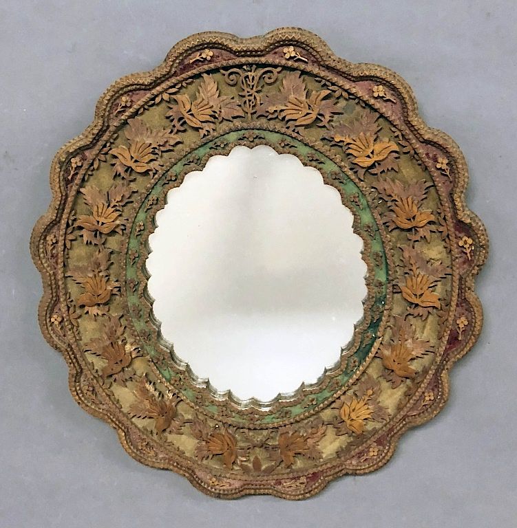 Appraisal: Tramp Art Mirror Tramp Art mirror with extensively carved frame