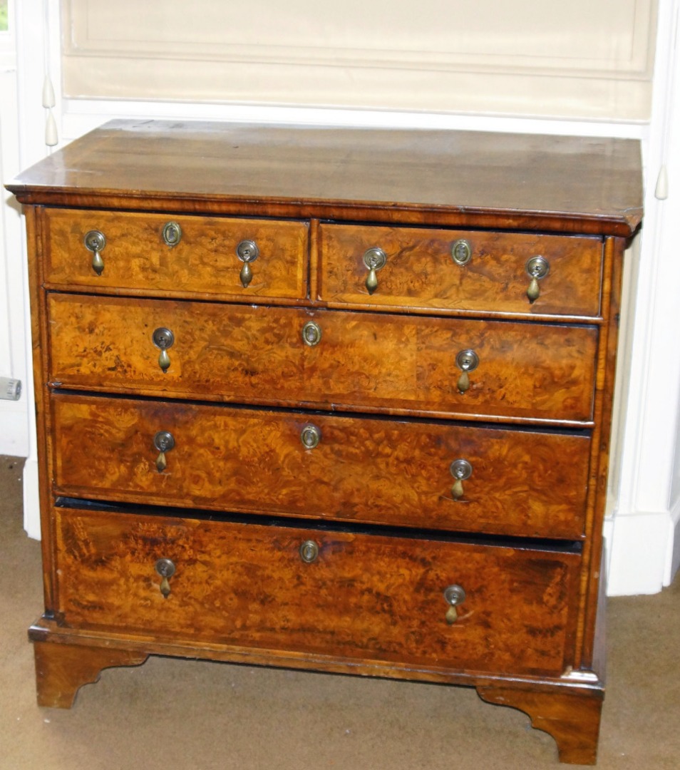 Appraisal: A mid thC walnut and burr walnut chest of drawers