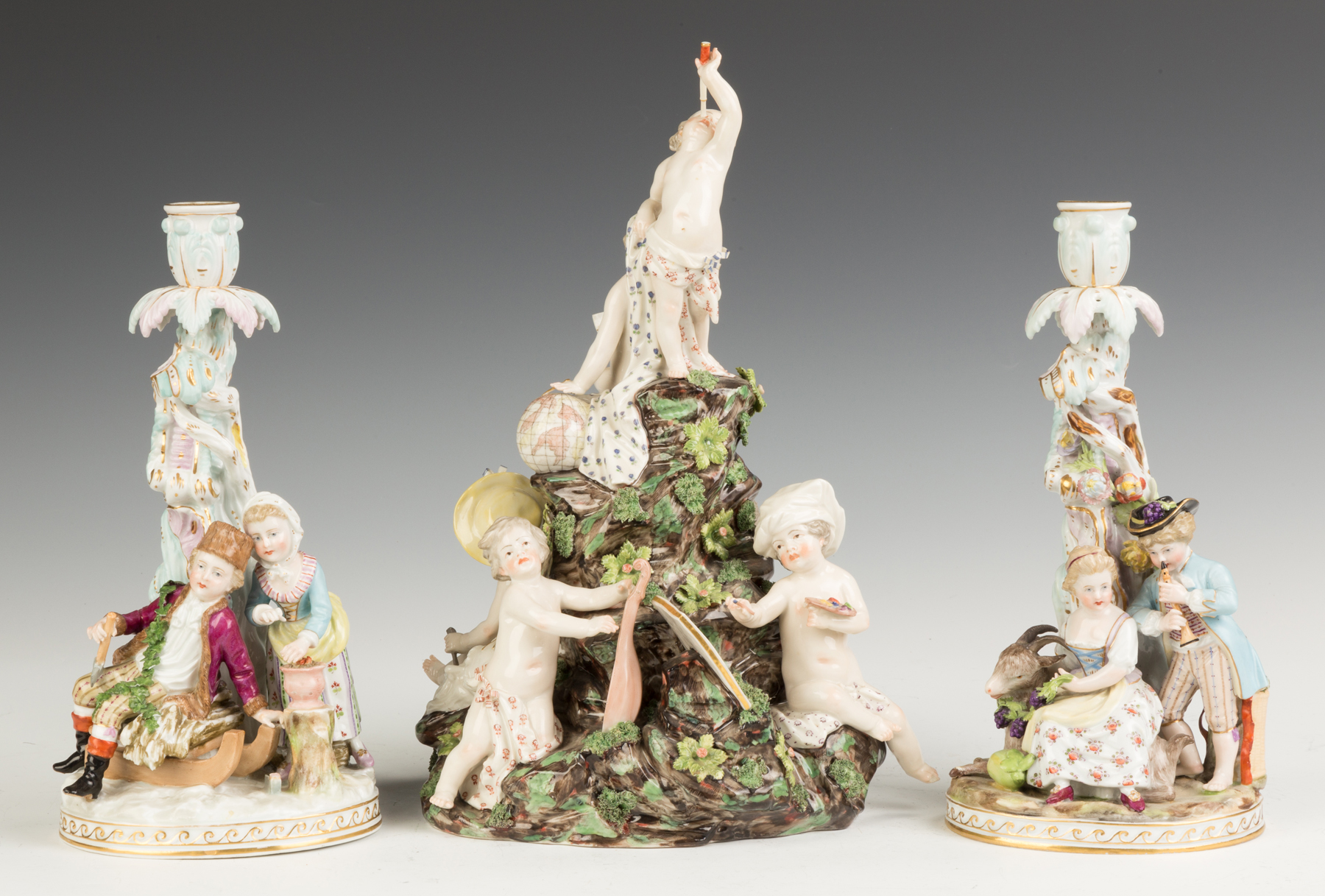 Appraisal: Dresden Candlesticks and Porcelain Figural Group Dresden Figural Candle Holders