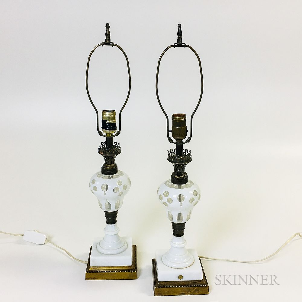 Appraisal: Pair of Overlay Glass Fluid Lamps Pair of Overlay Glass