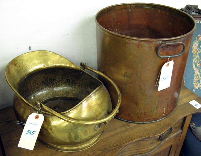 Appraisal: TWO ARTICLES OF METAL HOLLOWWARE brass helmet coal bucket and