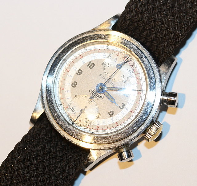 Appraisal: A STAINLESS STEEL 'S HEUER CHRONOGRAPH with arabic numerals and