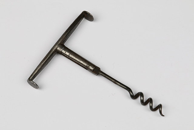 Appraisal: AN TH CENTURY DOUBLE FOLDER CORKSCREW with pipe tamper ends