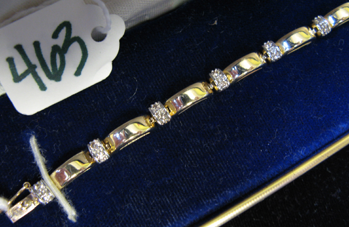 Appraisal: DIAMOND AND FOURTEEN KARAT GOLD BRACELET inches with yellow gold