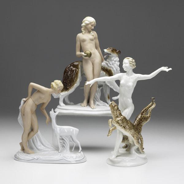 Appraisal: Three porcelain nude figurines all th C Hutschenreuther with cougars