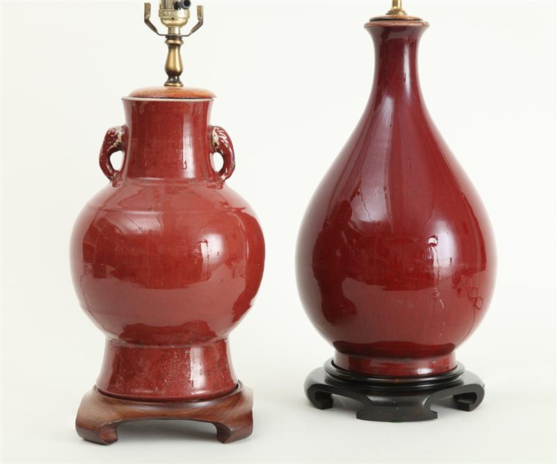 Appraisal: TWO CHINESE OX BLOOD-GLAZED PORCELAIN VASES MOUNTED AS LAMPS The