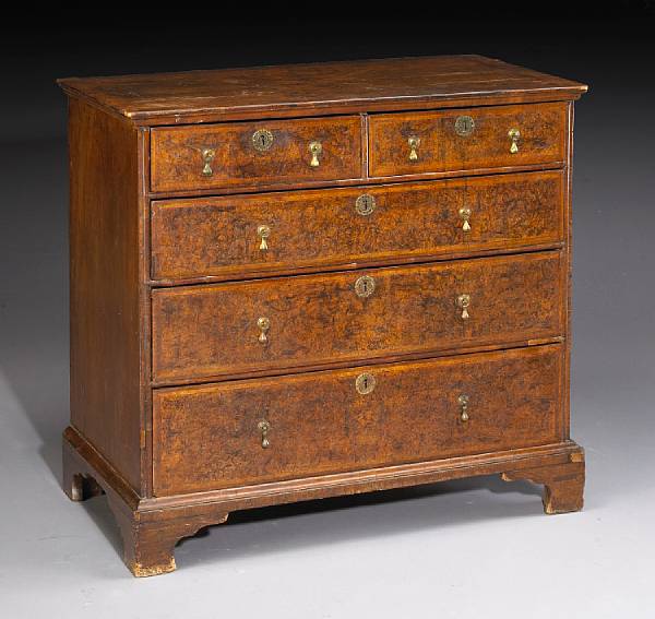 Appraisal: A George I pollard oak and walnut chest of drawers