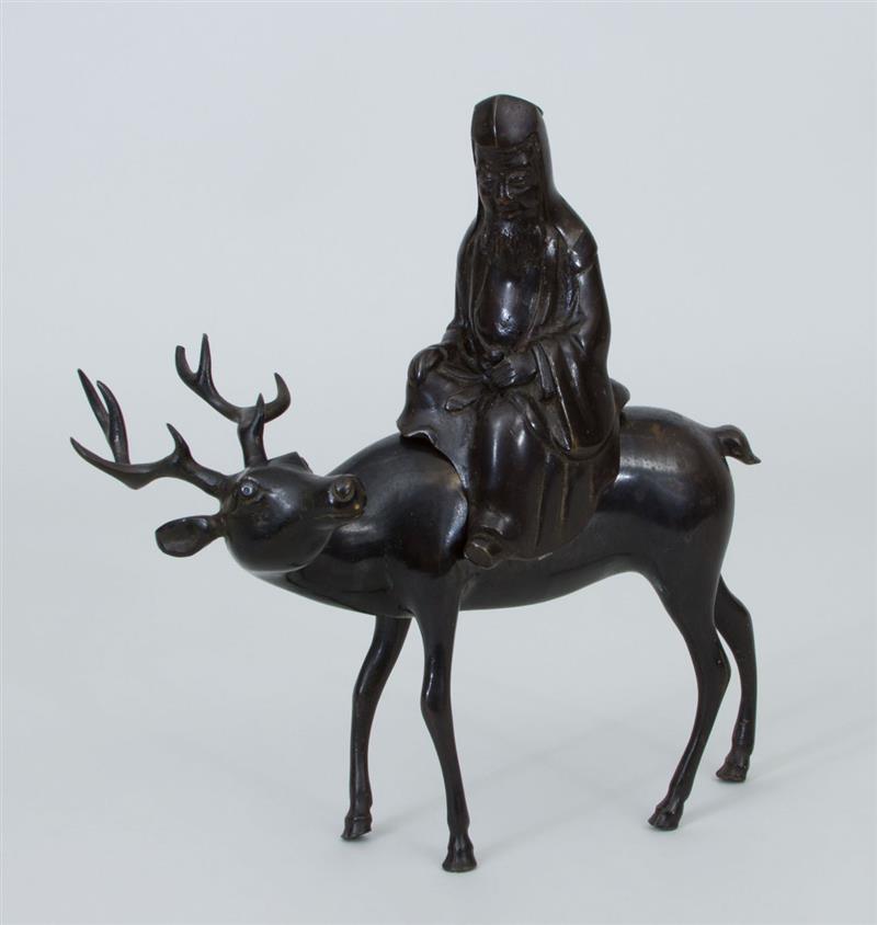 Appraisal: Chinese Bronze Figure of Shoulao Riding a Deer Rider is