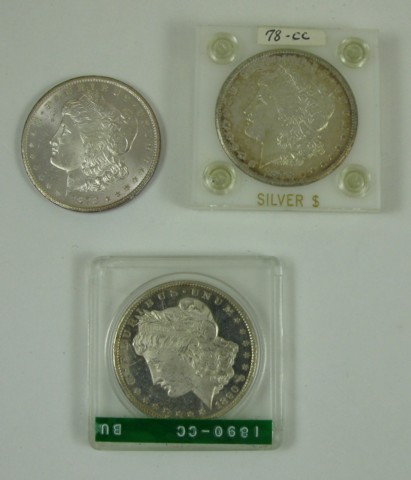 Appraisal: THREE CARSON CITY SILVER MORGAN DOLLARS and