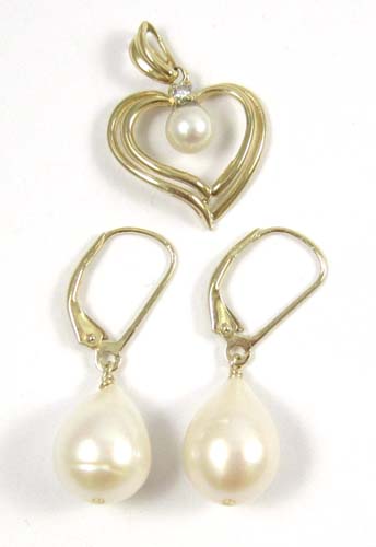 Appraisal: THREE ARTICLES OF PEARL JEWELRY including a k yellow gold