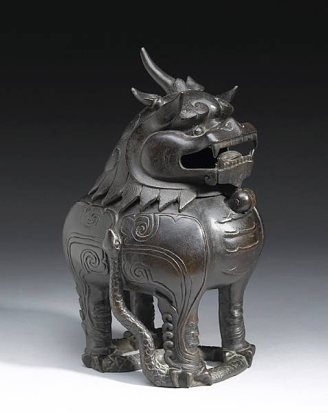 Appraisal: A cast bronze censer in the shape of a qilin