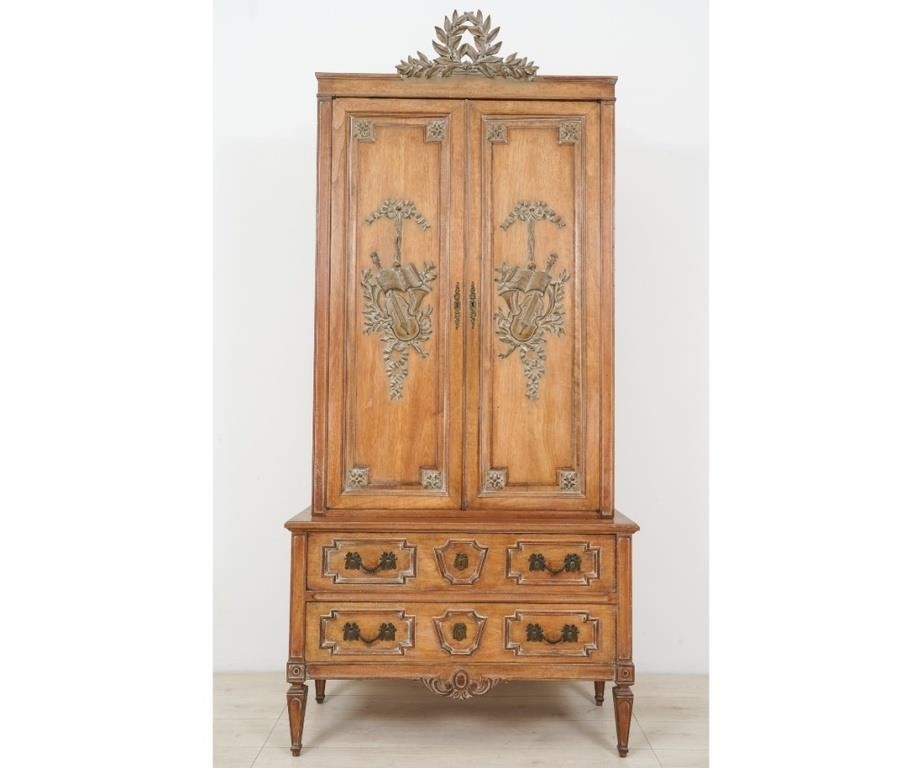 Appraisal: French fruitwood two-part music cabinet circa with doors of carved