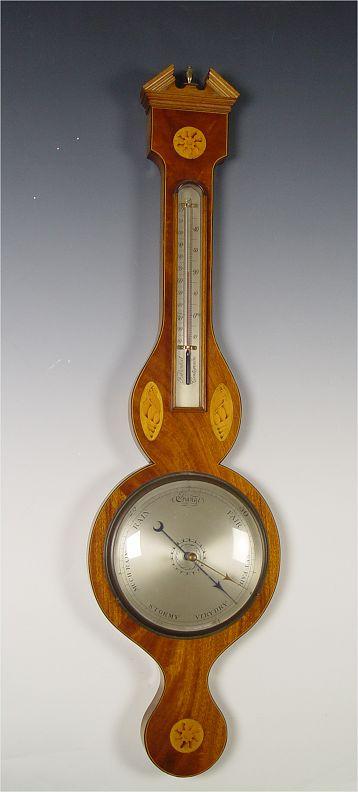 Appraisal: VICTORIAN INLAID BANJO BAROMETER Inlaid pinwheel and shell motif Unmarked