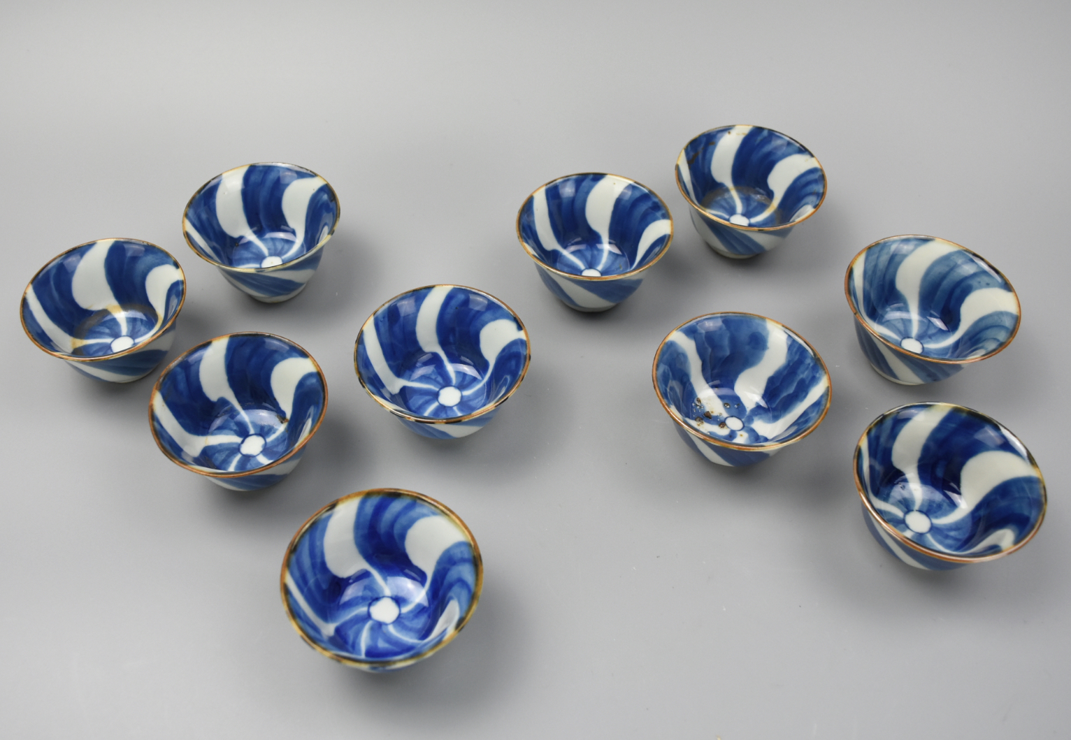 Appraisal: SMALL BLUE WHITE CHINESE SPIRAL CUPS TH C A lot