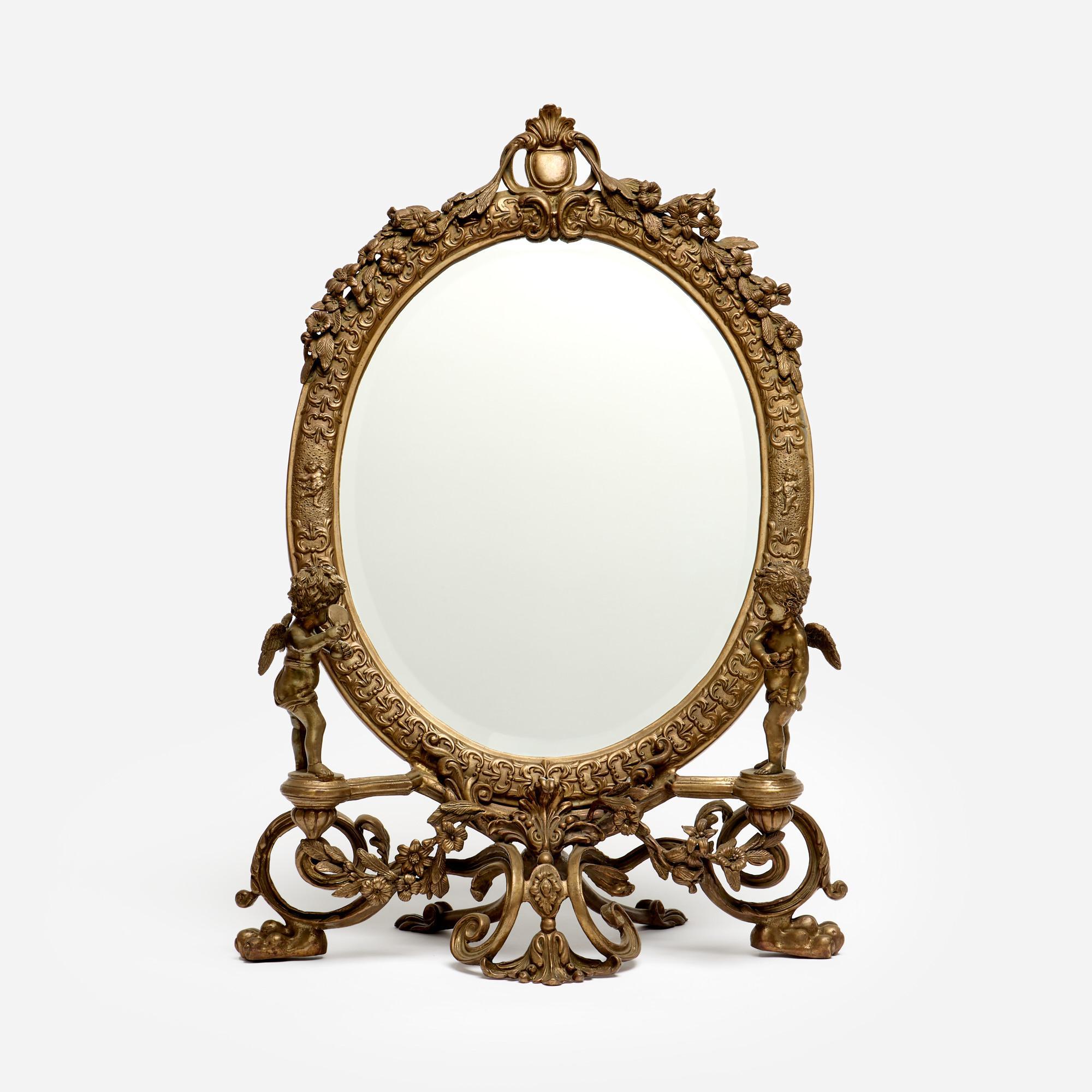 Appraisal: ANTIQUE GILT BRONZE VANITY MIRROR WITH CHERUBS A Louis XV-style