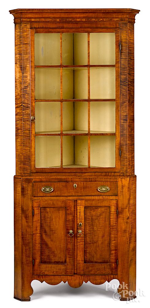 Appraisal: Pennsylvania tiger maple two-part corner cupboard Exclusive on Bidsquare Pennsylvania