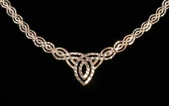 Appraisal: K YELLOW GOLD OPENWORK FLEXIBLE CHOKER Smooth and textured interwoven