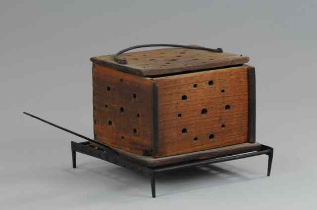 Appraisal: WOOD BED WARMER Iron handle wood box base has holes