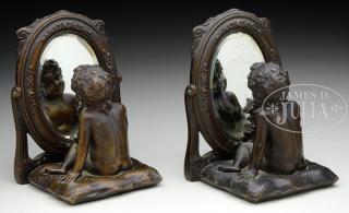 Appraisal: SIGNED TW BOOKENDS WITH CHILD IN FRONT OF MIRROR Bronze