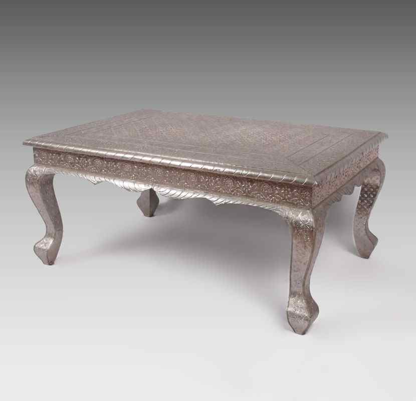 Appraisal: PERSIAN EMBOSSED METAL CLAD LOW TABLE '' h x ''