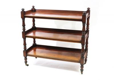 Appraisal: A Victorian mahogany buffet on turned supports with gadrooned finials