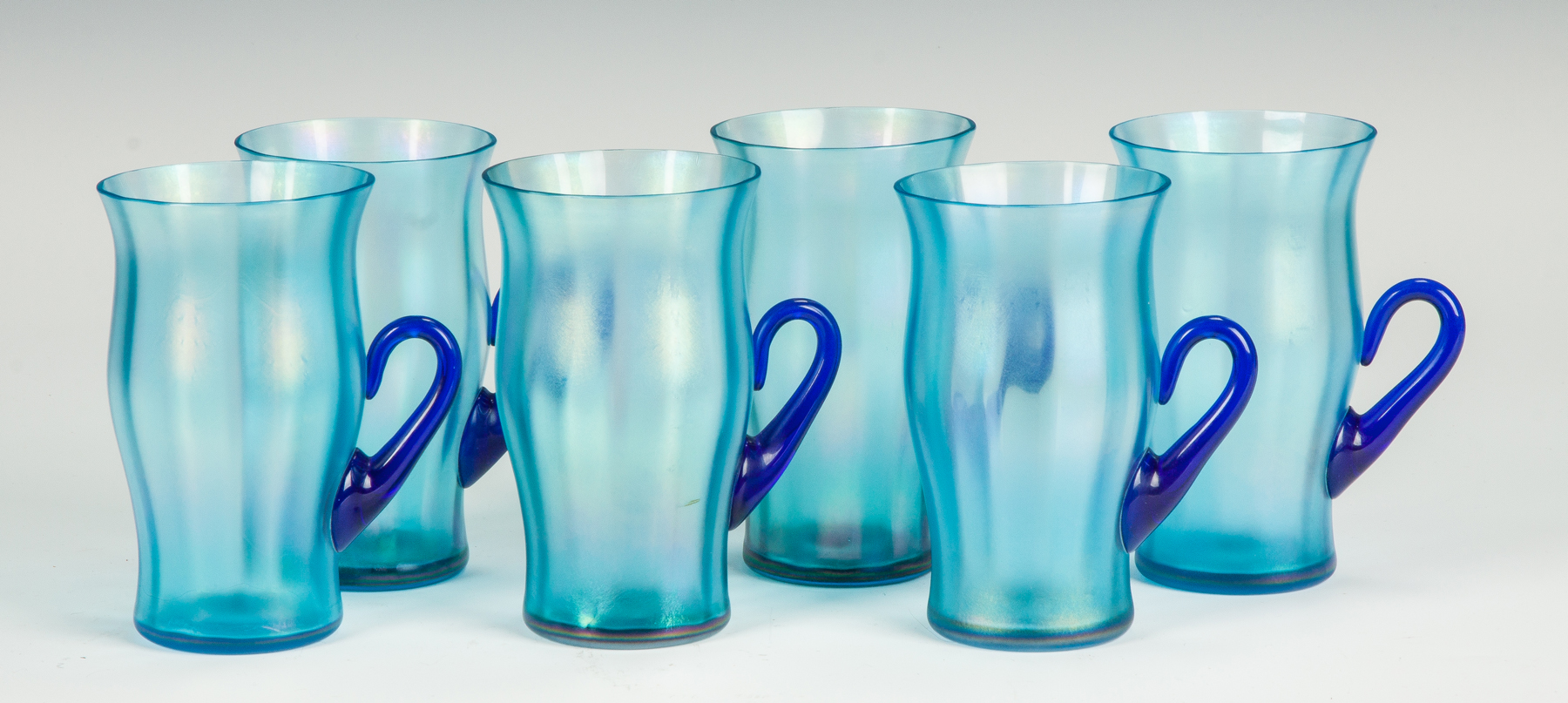 Appraisal: Stretch Glass Tumblers with Cobalt Blue Handles