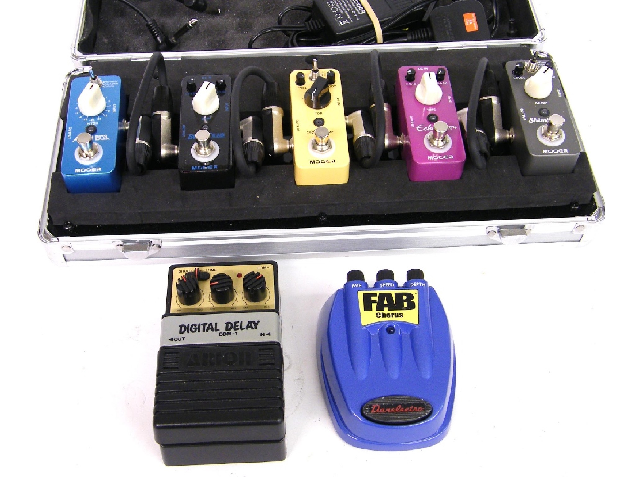 Appraisal: Cased set of five Mooer guitar effects pedals to include