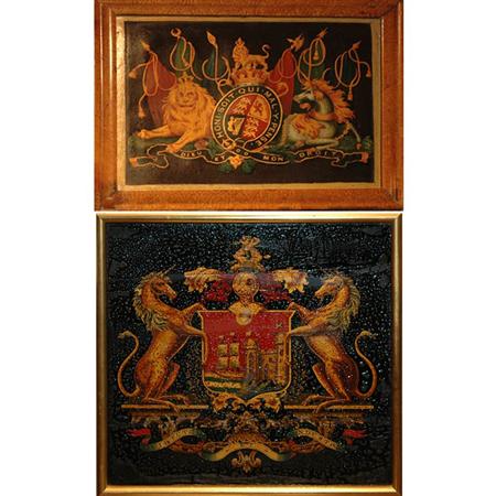 Appraisal: Pair of Painted Armorial Crests Estimate -