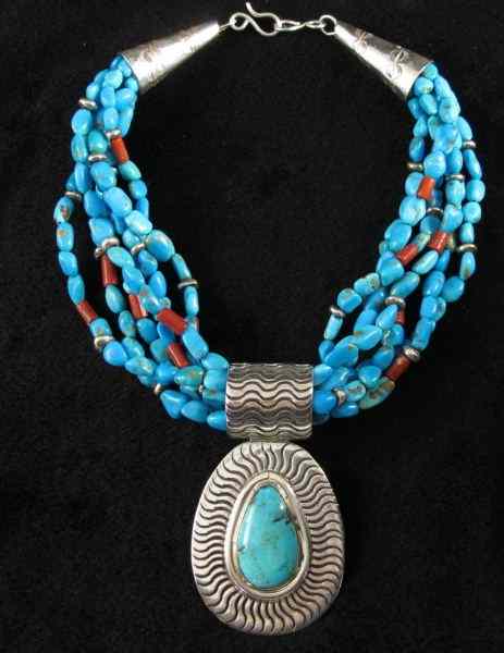 Appraisal: Turquoise and Sterling Pendant Necklacecomposed of strands of free form