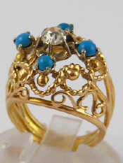 Appraisal: A French hallmarked carat gold diamond and turquoise ring the