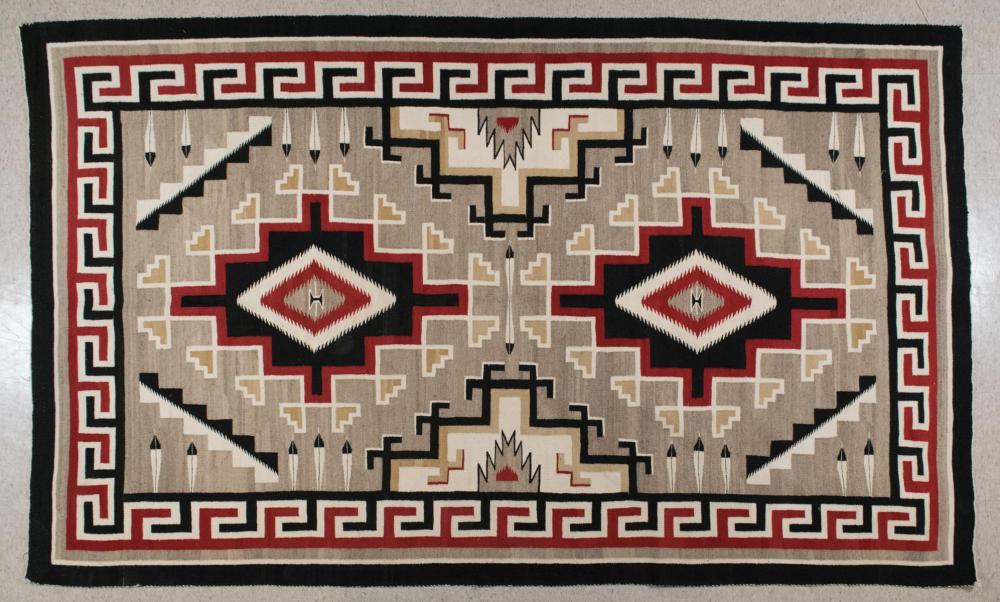 Appraisal: LARGE HAND WOVEN NAVAJO REGIONAL RUG double geometric medallion and