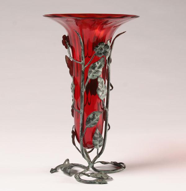 Appraisal: Murano Soffiati red trumpet vase in floral wrought metal base