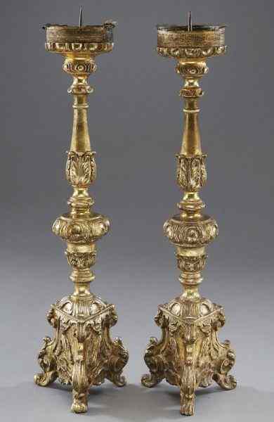 Appraisal: Pr Italian Rococo style prickets composed of carved wood and