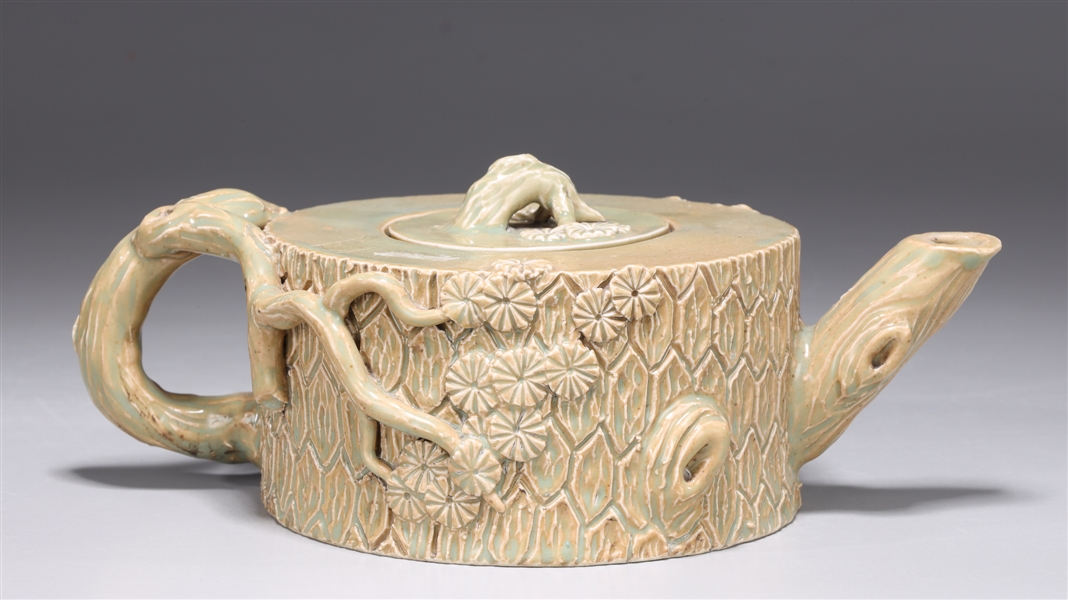 Appraisal: Chinese celadon glazed porcelain imitating wood covered teapot minor losses