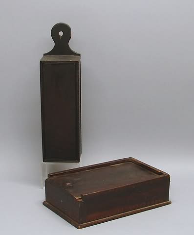 Appraisal: Hanging walnut box with sliding vertical door and circular hanger