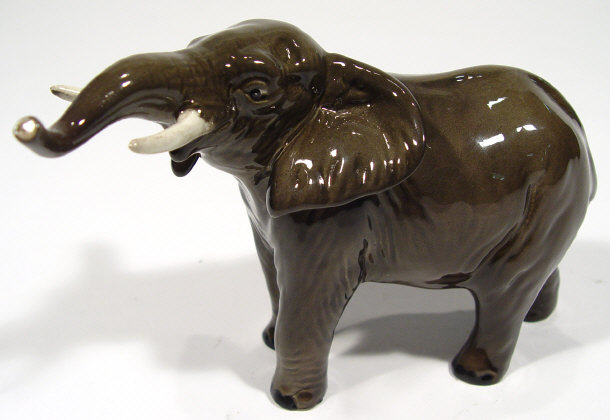 Appraisal: Beswick elephant with stretching trunk hand painted decoration and factory